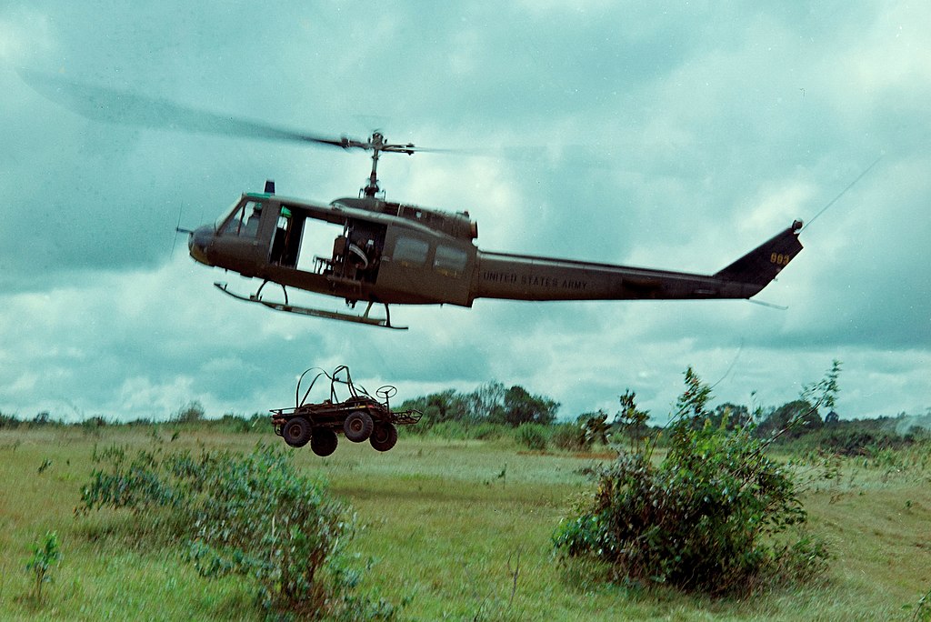 UH-1D preparing to drop M274 Mechanical Mule, Operation Harrison 1966