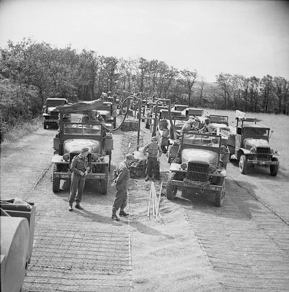 Supplying_Allied_Forces_After_D_Day_July_1944_GMC-trucks